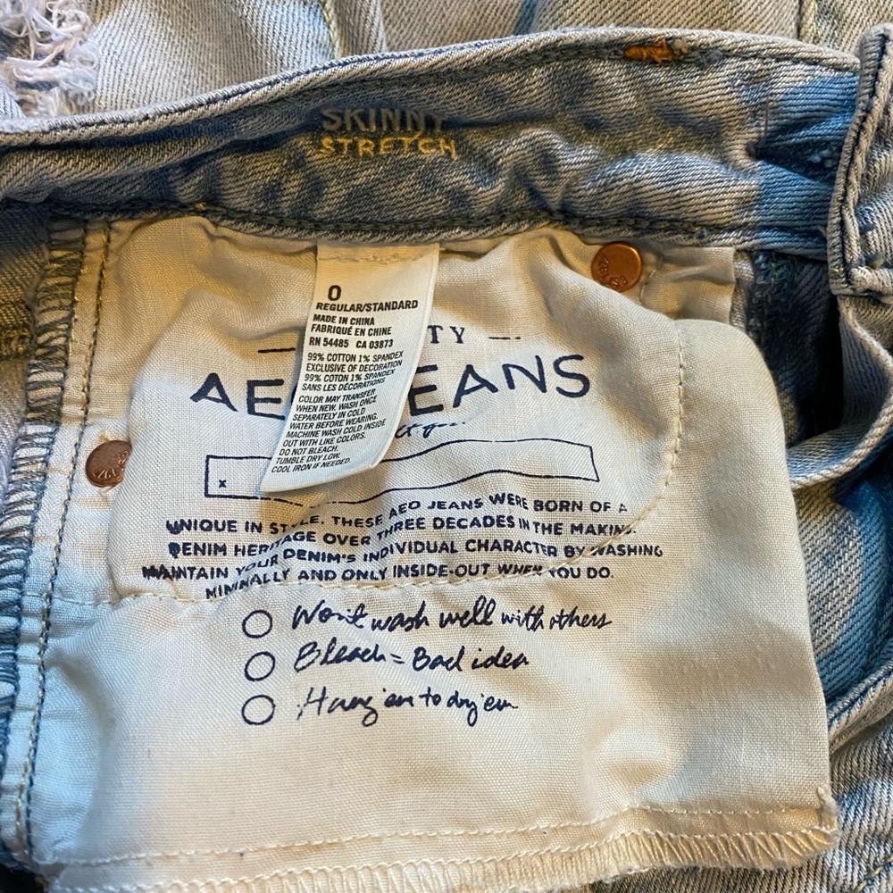 Light Washed Ripped Jeans - Picture 4 of 6